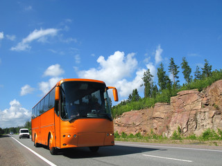 orange tourist bus, highway scandinavia