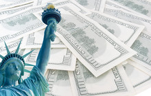 Statue Of Liberty On 100 Us Dollars Banknotes Background