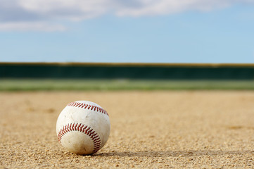 Wall Mural - one baseball on infield of sport field