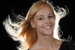 canvas print picture - Mädchen Blond Haare fliegen Gegenlicht lächeln