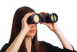 © StockMasters - Business woman strategist with binoculars