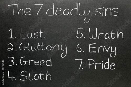 Fotografía The seven deadly sins, written in chalk on a blackboard.
