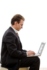 Businessman working on laptop computer,