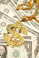 Sticker - Golden dollar-symbol necklace on cash