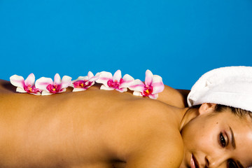 Wall Mural - Beautiful woman lying on massage table