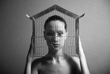 Surrealistic Portrait Of Young Woman With Cage.