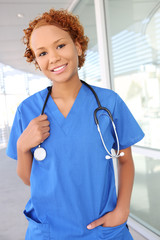 Wall Mural - A pretty african american woman nurse at the hospital