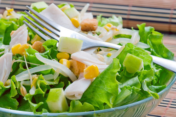 Wall Mural - lettuce salad with sweet corn and turkey ham