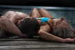 © Tsian - Young couple is relaxing after swiming
