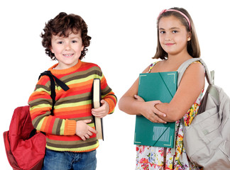 Wall Mural - Two children students returning to school on a white background