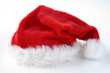 © Monkey Business - Red Santa Hat Against White Studio Background