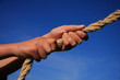 Hands Pulling On Rope