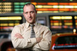 Businessman over stock exchange background