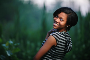 Wall Mural - Beautiful teenage girl outdoors. Shallow DOF.