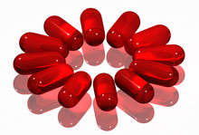 Capsules On White Red Transparent Pills