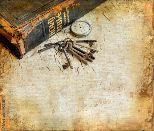 Fototapeta dla dzieci Vintage Bible with pocketwatch and keys grunge background