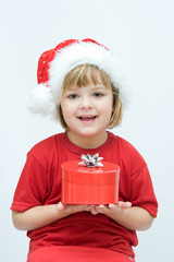 Poster - Christmas kid in Santa hat on white background