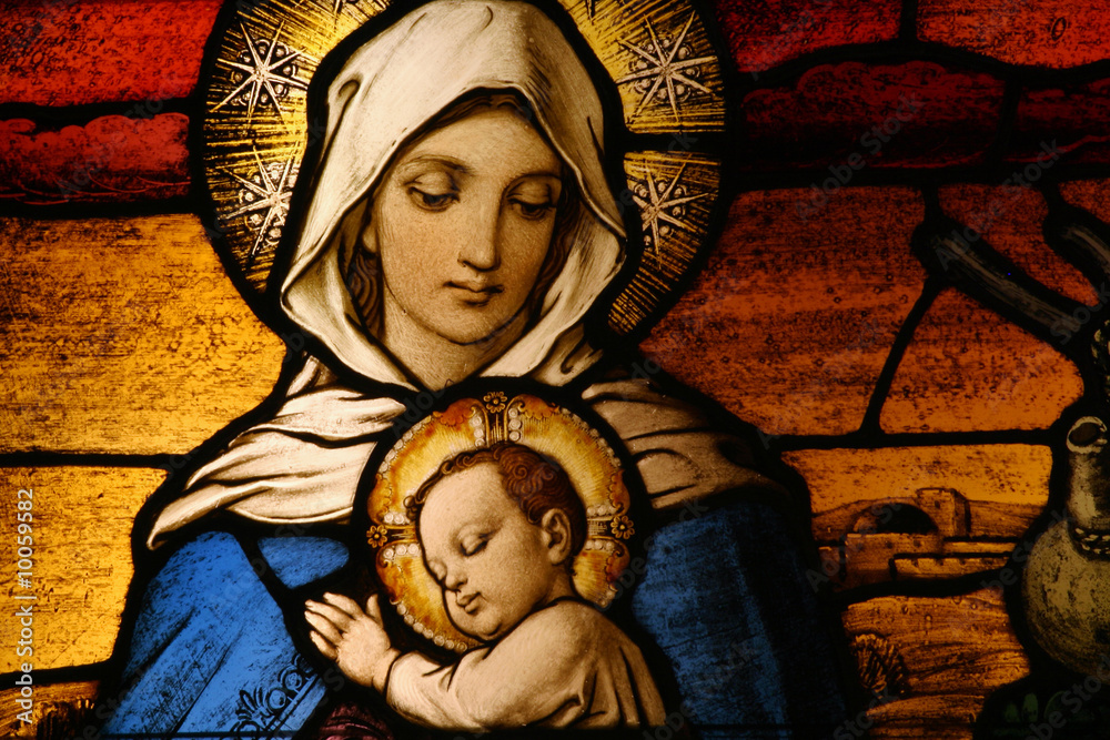 Stained glass depicting the Virgin Mary holding baby Jesus - obrazy, fototapety, plakaty 