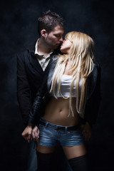 young couple in love, studio dark