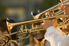 Young Musicians Are Playing On Trombones