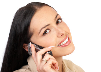 Wall Mural - Young smiling woman calling by  phone. Over white background.