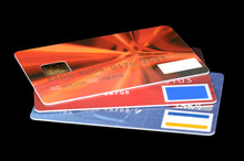 Bank Credit Or Debit Cards Isolated On Black Background.