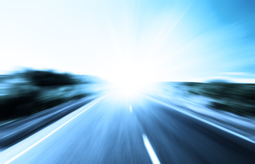 motion blur road and sun