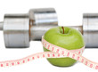 © archana bhartia - composition with apple, tape-measure and dumbbells