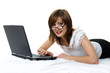 © zzzdim - businesswoman with laptop lying on the floor.
