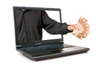 Hand with money come out from a screen of a laptop