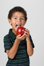 Boy Biting Apple