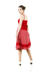 Wall Mural - Rear view of a beautiful woman with a red dress