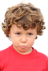 Poster - Adorable boy sad and gotten upset on a over white background