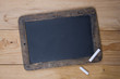 © Lagui - An old blank blackboard and white chalk