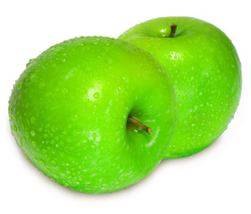 two fresh green apple with water drops over white