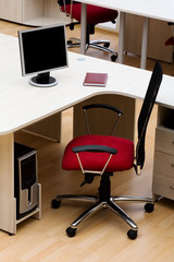 Beautiful and new red chair at modern office