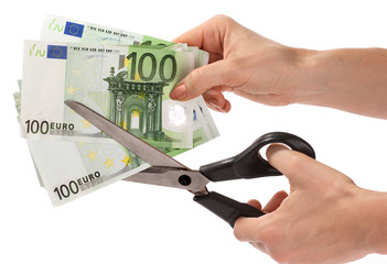 Scissors and euro.