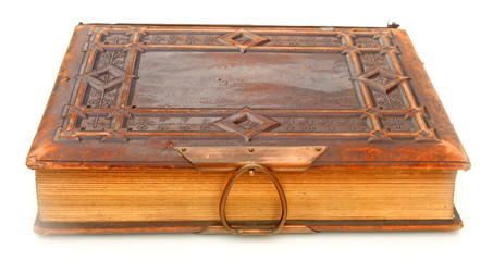 Single old leather bound book isolated on a white background