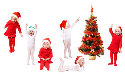 Wall Mural - children in christmas hat with fir