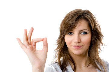 Young businesswoman indicating ok sign.