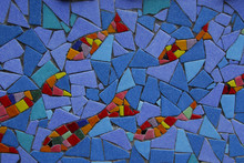 Mosaic Fish Swimming Down Stream