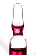Glass ampoule with red liquid medicine