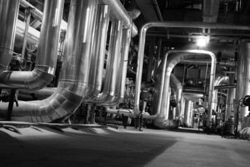 Wall Mural - Pipes, tubes, machinery and steam turbine at a power plant