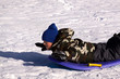 © Mehmet Dilsiz - Little Boy Sledding down the Hill