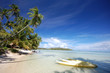 Yellow kayaks, white sand beach, Moorea, French Polynesia