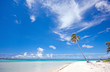 White sand beach on blue sky, Maupiti, Bora, French Polynesia