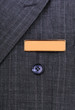 nametag on the business suit