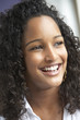 © Monkey Business - Portrait Of Teenage Girl Smiling