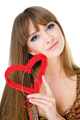 Young blond with a red knit heart