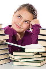 Wall Mural - Adorable girl with many books thinking